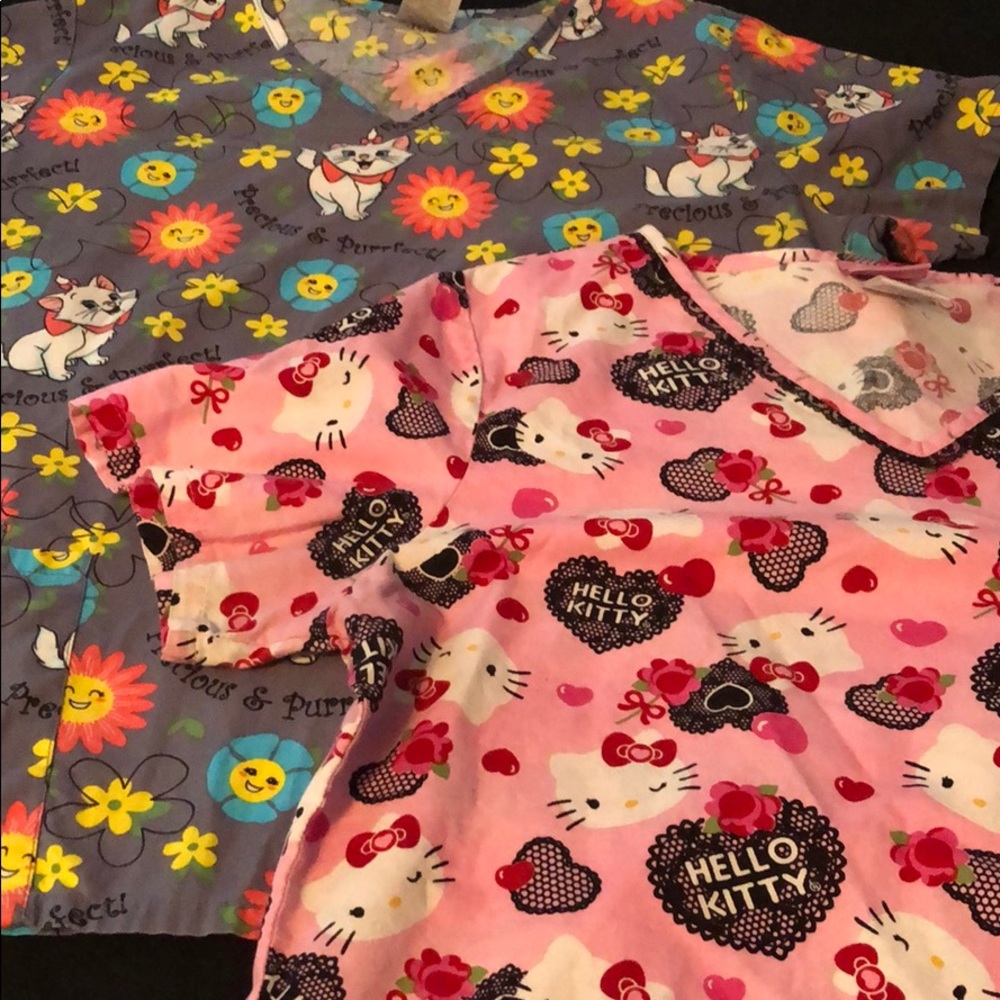 Scrub tops/Uniforms set of 2 both size medium